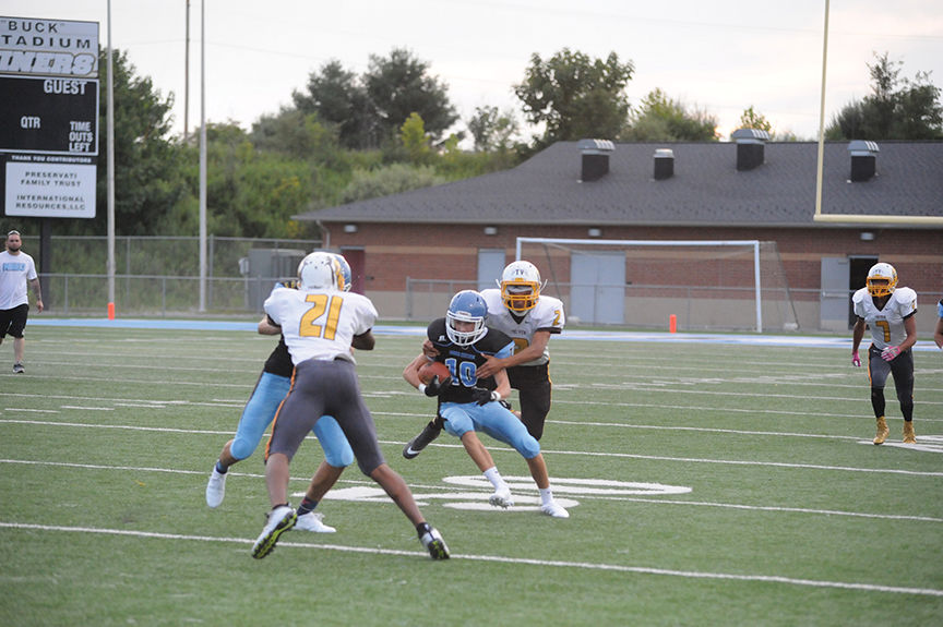 8-24 mc devin hatfield run the ball.jpg